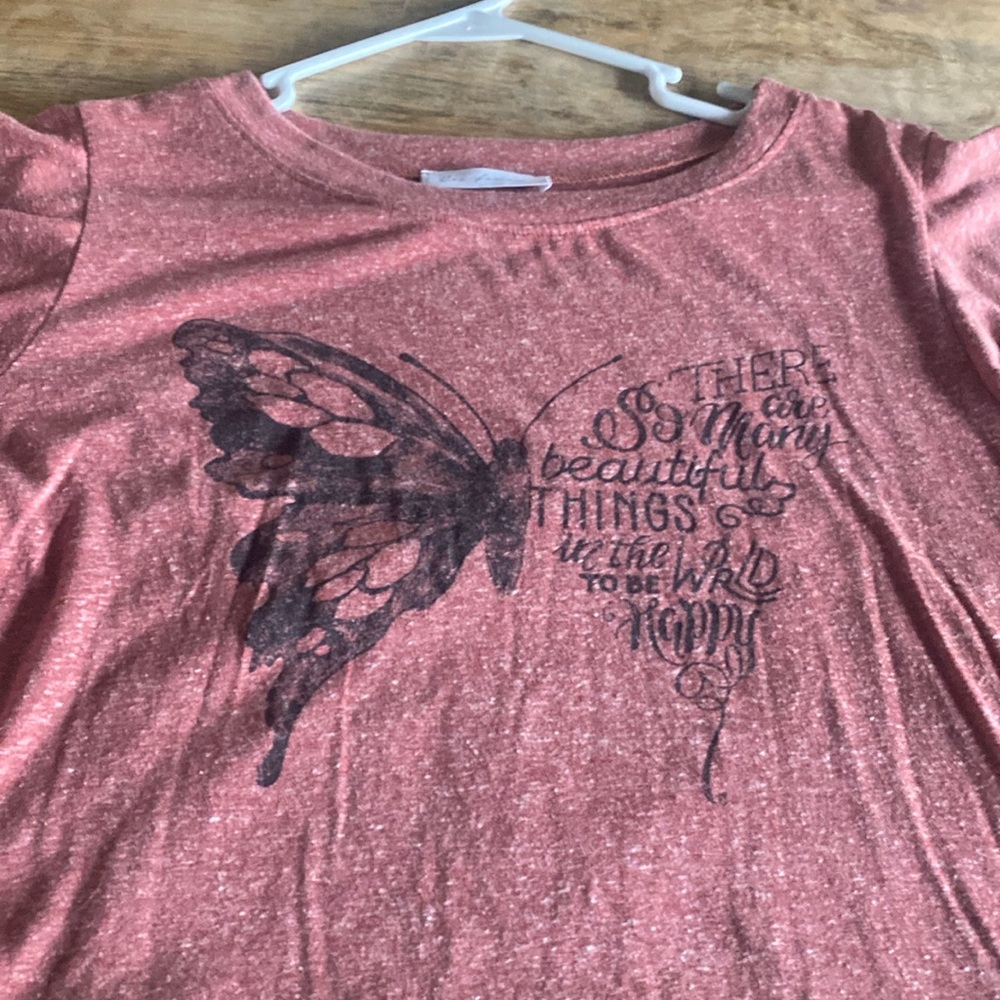 Women’s shirt with butterfly on the front. Cute flutter sleeves. Size-L.